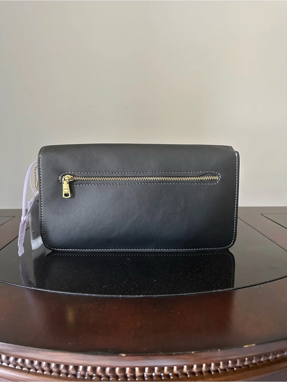 Coach Black Leather Shoulder Bag with Gold 'C' Accent